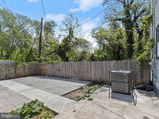 3833 Reisterstown Rd, Baltimore, MD 21215 - view of patio with central air condition unit and a fenced backyard