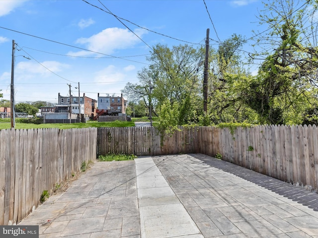 3833 Reisterstown Rd, Baltimore, MD 21215 - view of patio featuring a fenced backyard