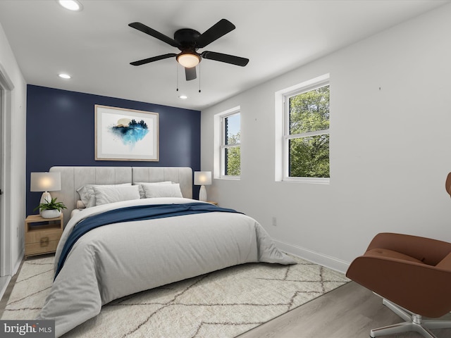 3833 Reisterstown Rd, Baltimore, MD 21215 - bedroom with baseboards, a ceiling fan, recessed lighting, and wood finished floors