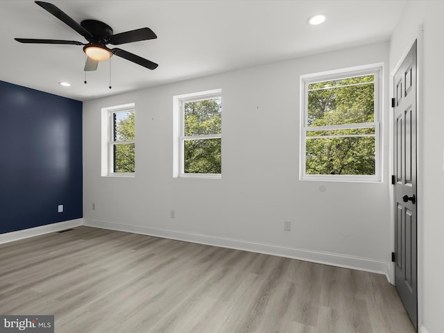 3833 Reisterstown Rd, Baltimore, MD 21215 - spare room with ceiling fan, visible vents, baseboards, light wood finished floors, and recessed lighting