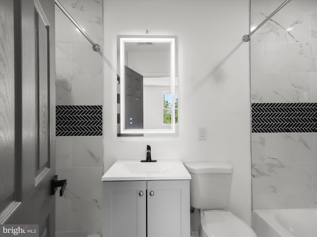 3833 Reisterstown Rd, Baltimore, MD 21215 - full bath featuring vanity, washtub / shower combination, and toilet