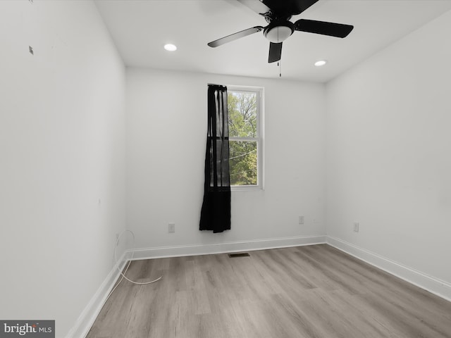 3833 Reisterstown Rd, Baltimore, MD 21215 - spare room featuring visible vents, baseboards, and wood finished floors