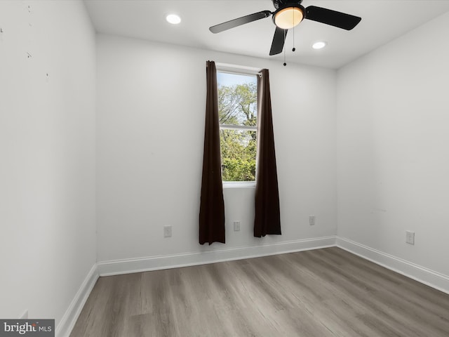3833 Reisterstown Rd, Baltimore, MD 21215 - unfurnished room featuring baseboards, recessed lighting, ceiling fan, and wood finished floors