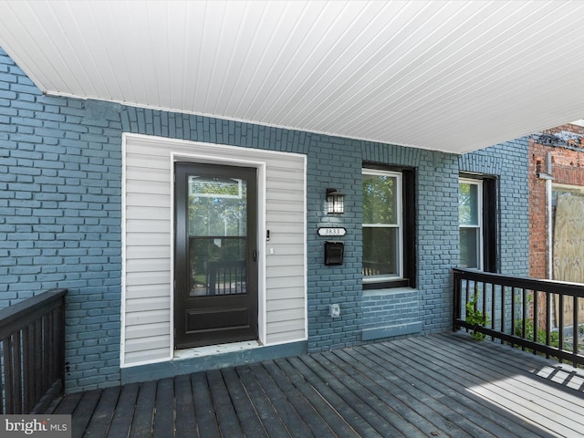 3833 Reisterstown Rd, Baltimore, MD 21215 - doorway to property featuring brick siding