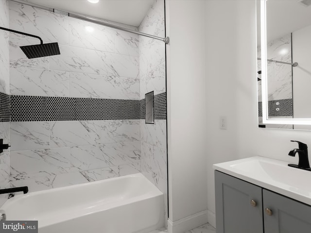 3833 Reisterstown Rd, Baltimore, MD 21215 - full bathroom with vanity, baseboards, marble finish floor, and bathtub / shower combination