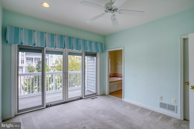 11 Marina View Ct Unit A-6, Bethany Beach, DE 19930 - spare room with baseboards, carpet, a ceiling fan, and visible vents
