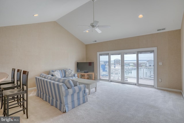 11 Marina View Ct Unit A-6, Bethany Beach, DE 19930 - living room featuring a ceiling fan, visible vents, baseboards, lofted ceiling, and light carpet