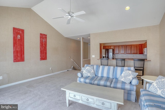 11 Marina View Ct Unit A-6, Bethany Beach, DE 19930 - living area with baseboards, ceiling fan, lofted ceiling, and light colored carpet