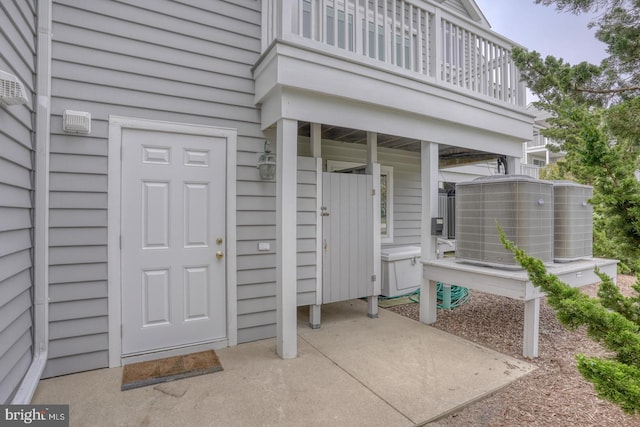 11 Marina View Ct Unit A-6, Bethany Beach, DE 19930 - entrance to property with central AC unit and a balcony