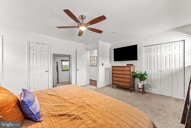 bedroom with carpet floors, a ceiling fan, and baseboards