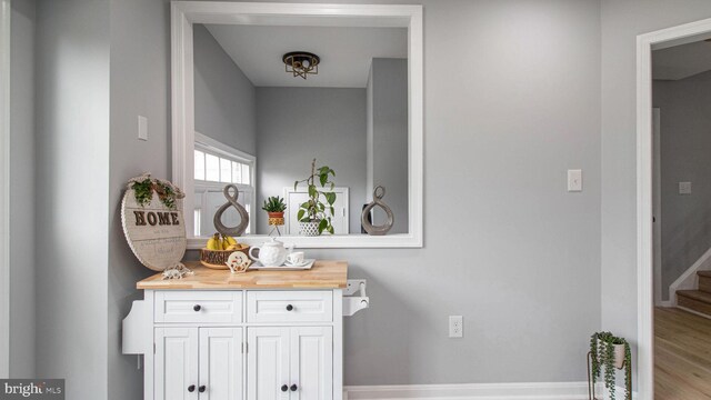 46932 Trumpet Cir, Sterling, VA 20164 - bathroom with baseboards and wood finished floors