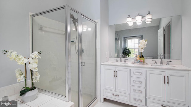 46932 Trumpet Cir, Sterling, VA 20164 - bathroom with a shower stall, double vanity, and tile patterned floors