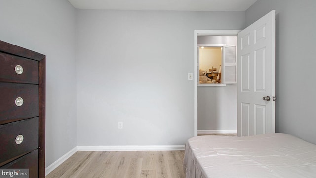 46932 Trumpet Cir, Sterling, VA 20164 - bedroom with light wood finished floors and baseboards