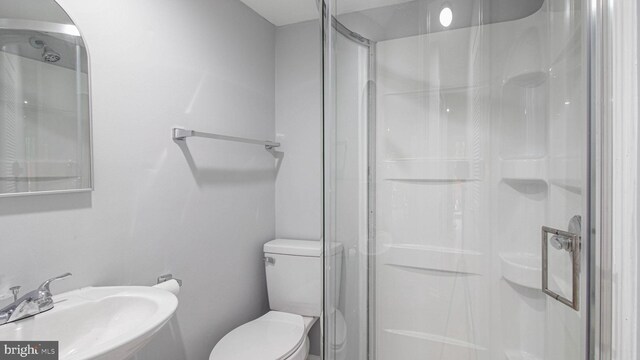 46932 Trumpet Cir, Sterling, VA 20164 - full bathroom with a sink, a stall shower, and toilet