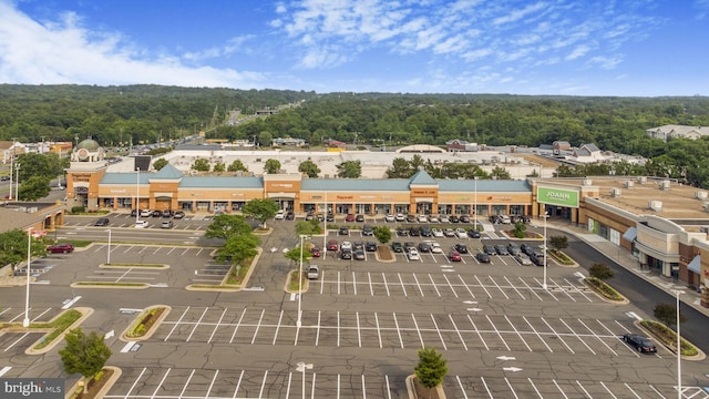 46932 Trumpet Cir, Sterling, VA 20164 - drone / aerial view of a commercial area and a heavily wooded area