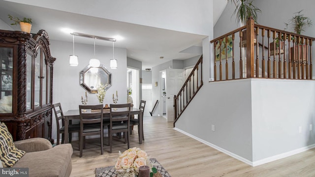 46932 Trumpet Cir, Sterling, VA 20164 - dining area with stairway, wood finished floors, and baseboards