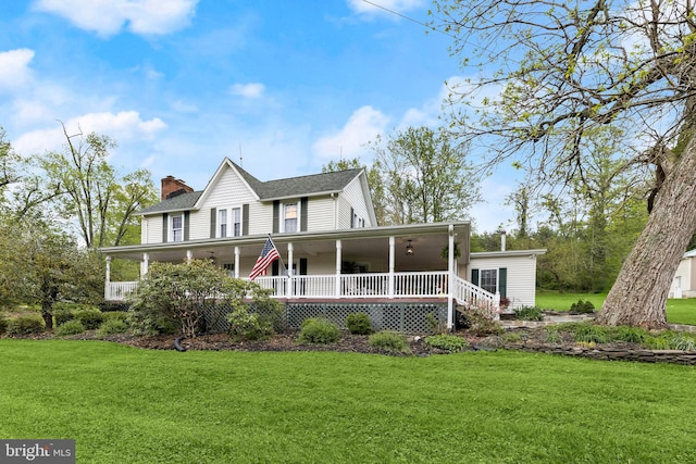 12943 Harford Rd, Hydes, MD 21082 - rear view of house with a yard, a chimney, and a porch