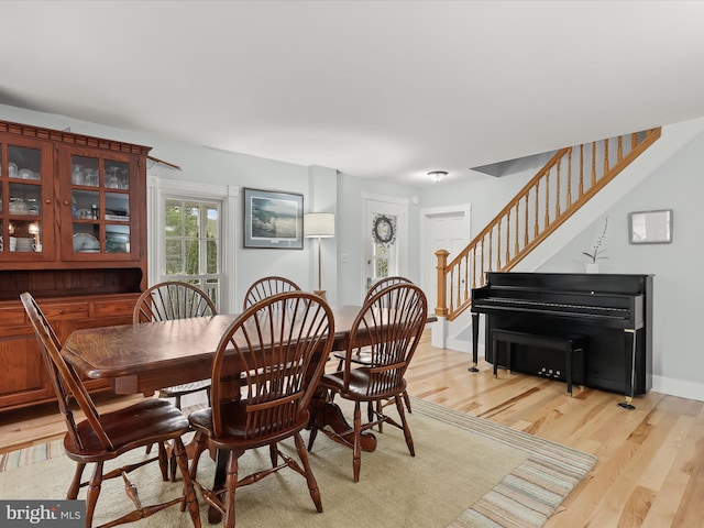12943 Harford Rd, Hydes, MD 21082 - dining space featuring light wood finished floors and stairway