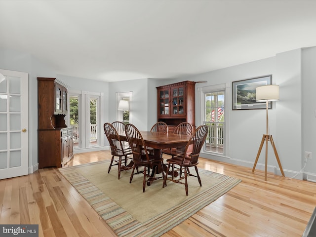 12943 Harford Rd, Hydes, MD 21082 - dining room with light wood-style floors, healthy amount of natural light, and baseboards