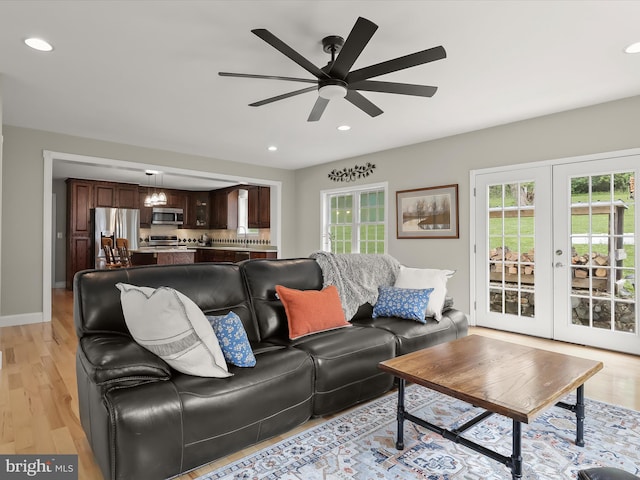 12943 Harford Rd, Hydes, MD 21082 - living room featuring healthy amount of natural light, a ceiling fan, recessed lighting, light wood-type flooring, and baseboards