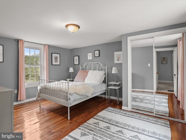 12943 Harford Rd, Hydes, MD 21082 - bedroom with baseboards, wood finished floors, and a closet