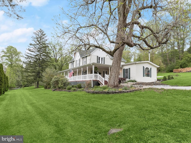 12943 Harford Rd, Hydes, MD 21082 - rear view of house featuring a porch and a yard