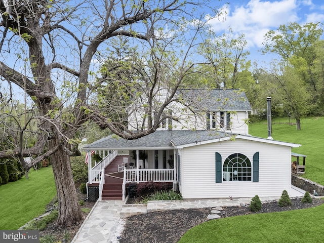 12943 Harford Rd, Hydes, MD 21082 - view of front of home with a porch, a front lawn, and a shingled roof