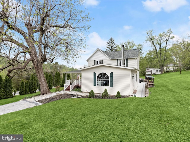 12943 Harford Rd, Hydes, MD 21082 - traditional-style home featuring covered porch, a front lawn, and roof with shingles