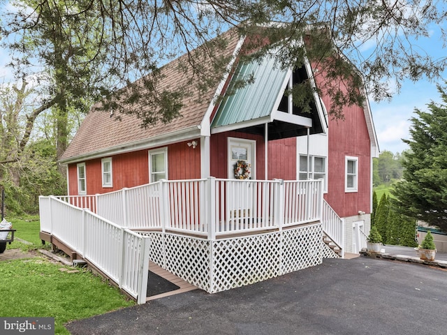 12943 Harford Rd, Hydes, MD 21082 - view of front of home with covered porch, roof with shingles, and asphalt driveway