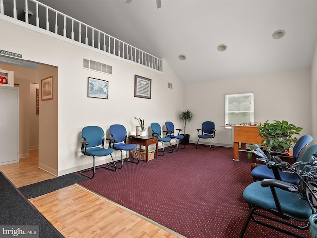 12943 Harford Rd, Hydes, MD 21082 - sitting room featuring high vaulted ceiling, baseboards, and wood finished floors