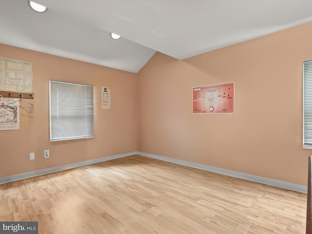 12943 Harford Rd, Hydes, MD 21082 - empty room with light wood-style floors, baseboards, and vaulted ceiling