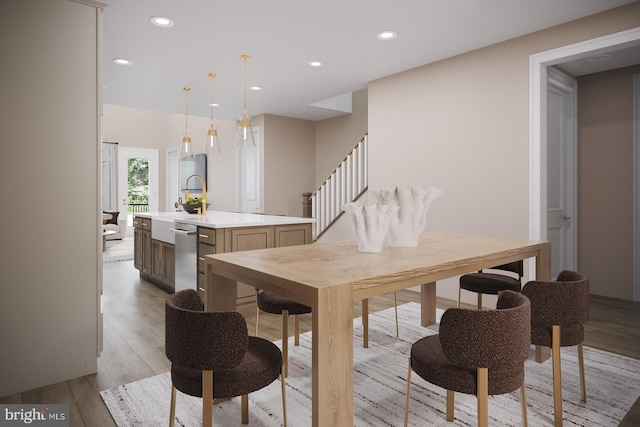 dining area with stairs, recessed lighting, and light wood-type flooring