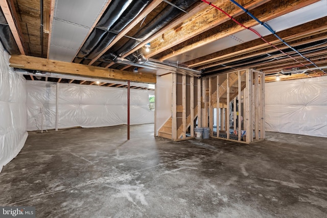 unfinished basement with stairs