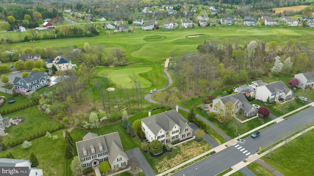 bird's eye view with a residential view and view of golf course