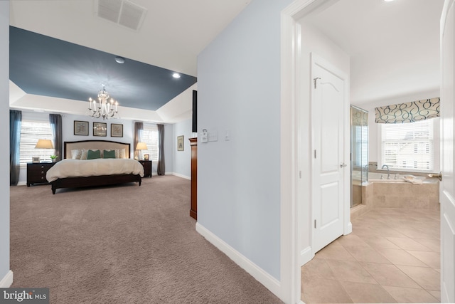 bedroom with visible vents, an inviting chandelier, light tile patterned flooring, baseboards, and light colored carpet