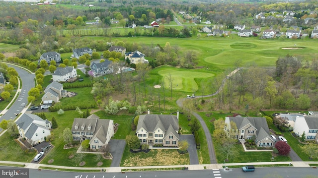 bird's eye view featuring view of golf course and a residential view
