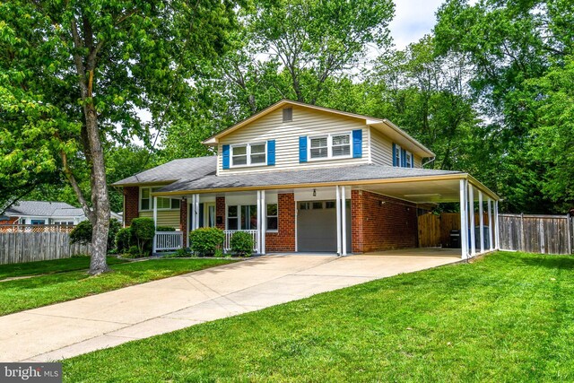8916 Battery Rd, Alexandria, VA 22308 - view of front of house featuring a porch, concrete driveway, a carport, a garage, and brick siding