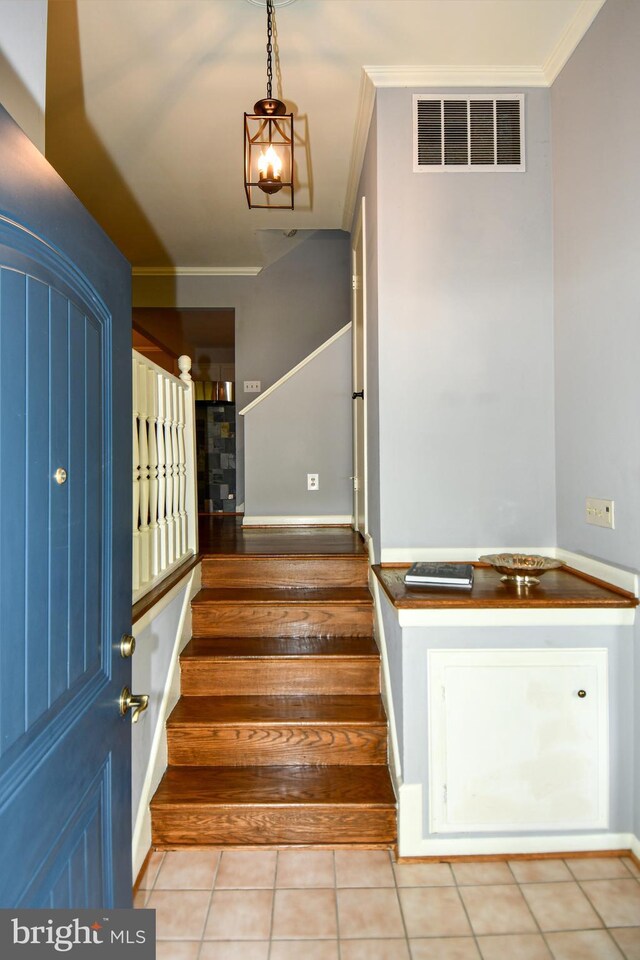 8916 Battery Rd, Alexandria, VA 22308 - stairs with crown molding and tile patterned flooring