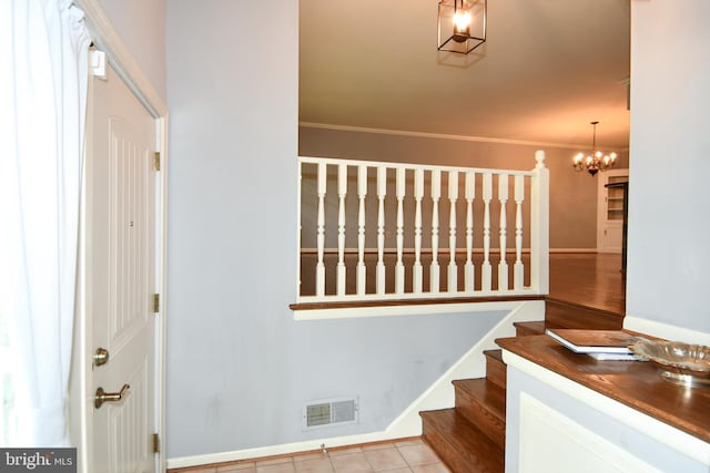 8916 Battery Rd, Alexandria, VA 22308 - stairs featuring a chandelier, ornamental molding, and tile patterned floors