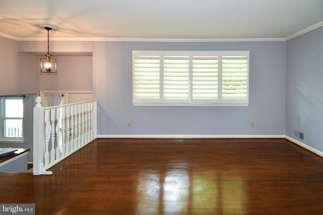 8916 Battery Rd, Alexandria, VA 22308 - spare room with wood finished floors, healthy amount of natural light, ornamental molding, and baseboards