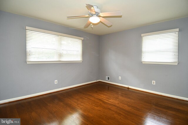 8916 Battery Rd, Alexandria, VA 22308 - empty room with wood finished floors, baseboards, and ceiling fan