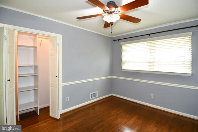 8916 Battery Rd, Alexandria, VA 22308 - unfurnished bedroom with dark wood-style floors, baseboards, crown molding, and a ceiling fan