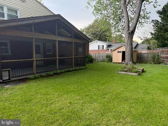 8916 Battery Rd, Alexandria, VA 22308 - view of yard with a sunroom