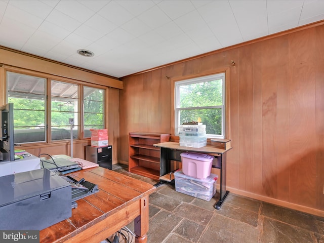 24 Keeler Ave, Stevens, PA 17578 - office area featuring wooden walls and dark stone finish flooring