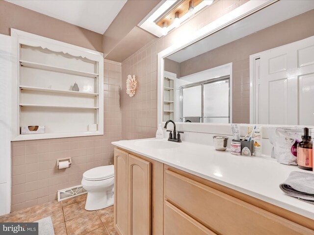 24 Keeler Ave, Stevens, PA 17578 - bathroom featuring tile walls, vanity, a shower stall, and tile patterned floors