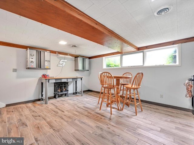 24 Keeler Ave, Stevens, PA 17578 - dining space with a wood stove and wood finished floors