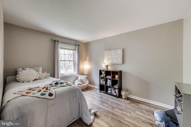 11378 Cromwell Ct, Woodbridge, VA 22192 - bedroom with wood finished floors and baseboards