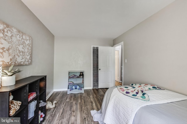 11378 Cromwell Ct, Woodbridge, VA 22192 - bedroom featuring baseboards and wood finished floors