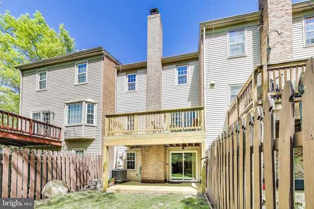 11378 Cromwell Ct, Woodbridge, VA 22192 - back of property with fence, a wooden deck, and cooling unit