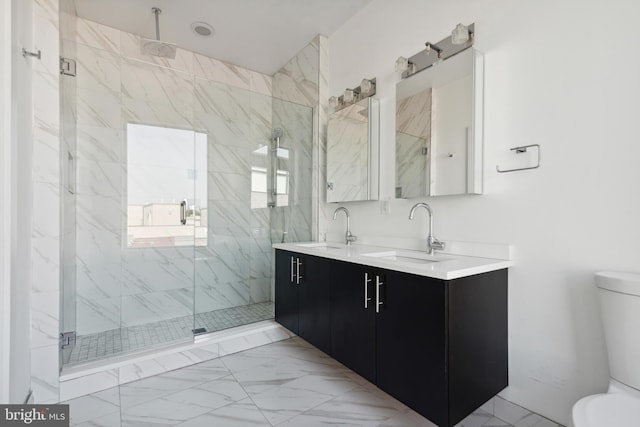 bathroom featuring toilet, marble look tiles, and a marble finish shower